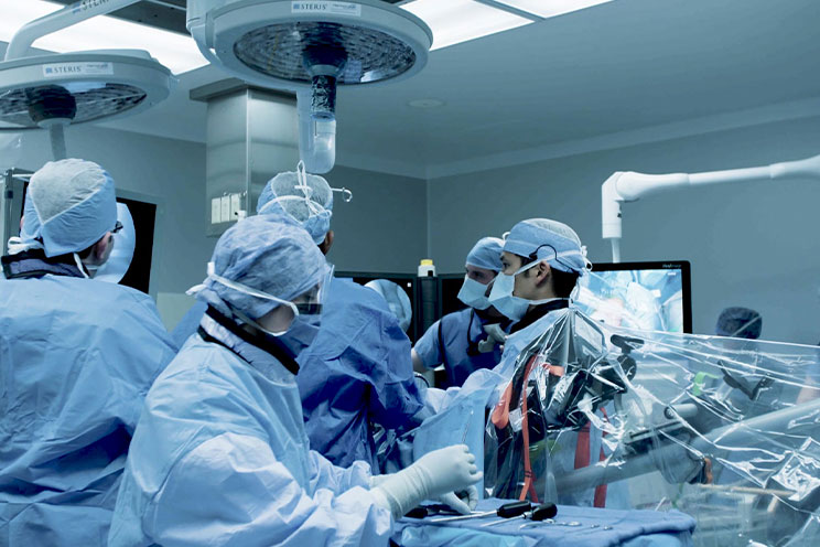 Doctors preparing for surgery in an OR