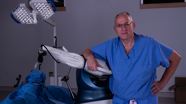 Dr. Michael Dunbar, QEII Foundation Endowed Chair Arthroplasty Outcomes with the surgical orthopaedic robot. 