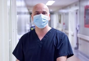 Caption: Darren Sharpe, nurse, in the QEII's Medical Day Unit.