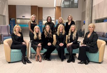 Ten women from the Orchid Women’s Health Initiative pose for the camera.