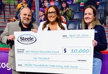 Halifax Thunderbirds present the QEII Foundation with a cheque.