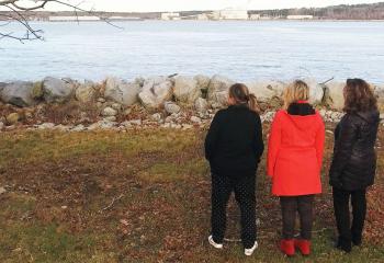 Murphy Family looking out onto the water