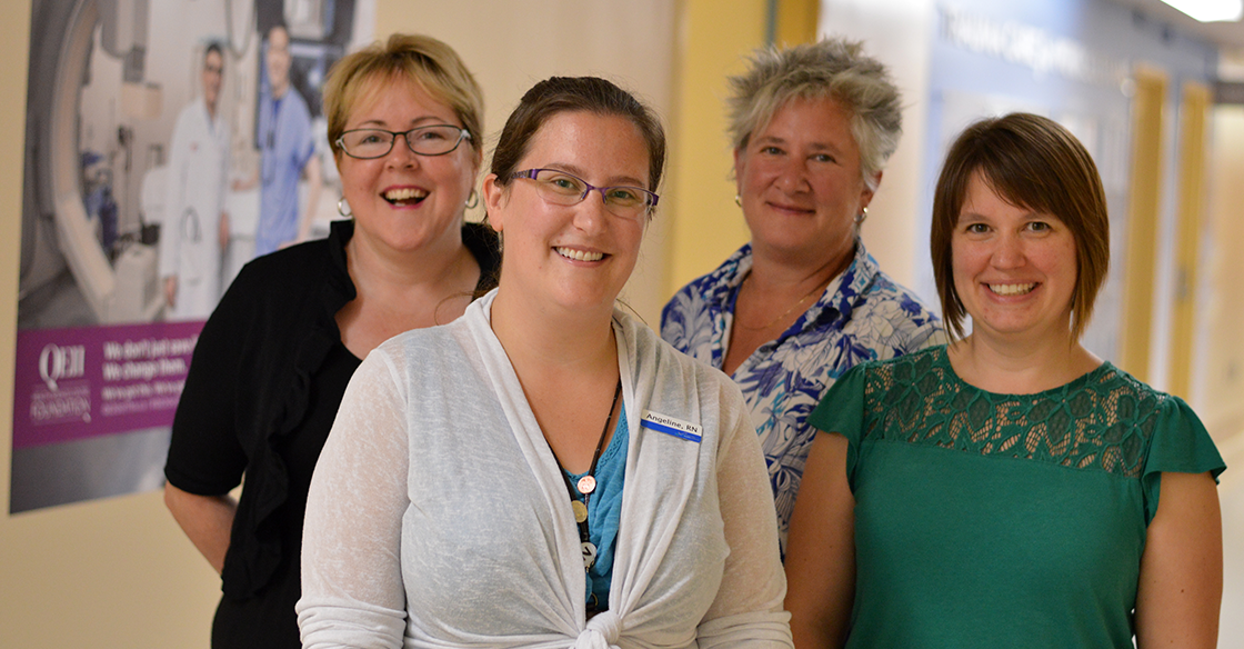 As part of the Interprofessional Practice and Learning team at the QEII, Shawna Hudson (left), Angeline Comeau (front), Jane Allen (back) and Andrea Goldstein (right), engage with clinical and support teams to help lay the foundation for collaborative learning for healthcare professionals to promote quality care for patients.
