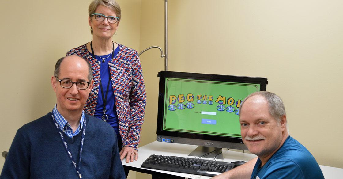 Dr. Gail Eskes (centre), Dalhousie University professor and researcher, Dr. Richard Braha (left), program manager for the QEII’s Acquired Brain Injury program, and Dave Kay (right)