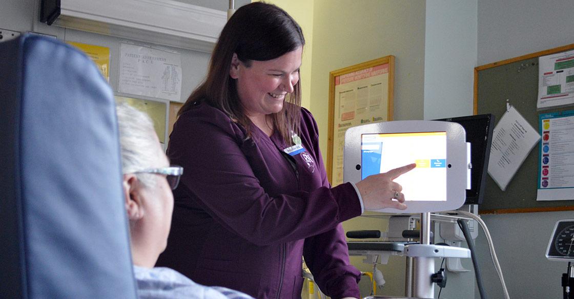 Interpreter on Wheels being used bedside