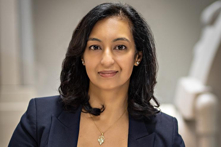 Dr. Ratika Parkash looks into the camera in a heart health treatment space.