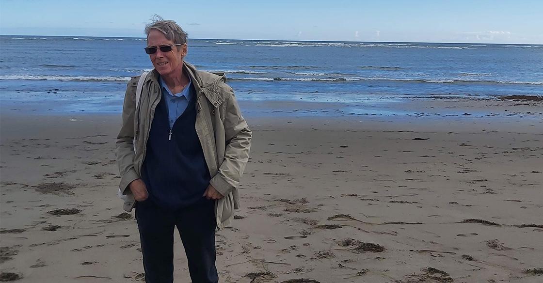 David Ferrigno standing on a beach