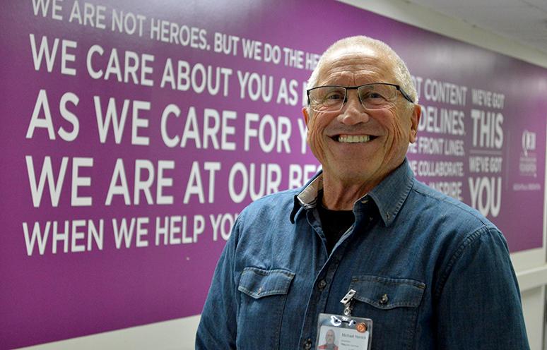 Volunteer Michael Herrick poses for the camera in the QEII's Halifax Infirmary building.