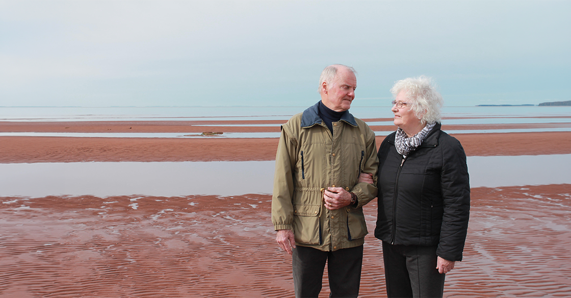 Stan and Helen Buell strolling the shores of PEI.