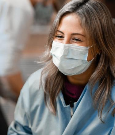 Healthcare worker talking to a patient