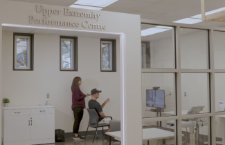 Pictured: Kris Johnston practices tasks to improve coordination and mobility using virtual reality technology in the QEII’s donor-funded Upper Extremity Performance Centre, following a stroke he suffered in winter 2025. 