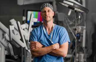 Dr. Alexander Ednie stands in operating room at QEII Health Sciences Centre