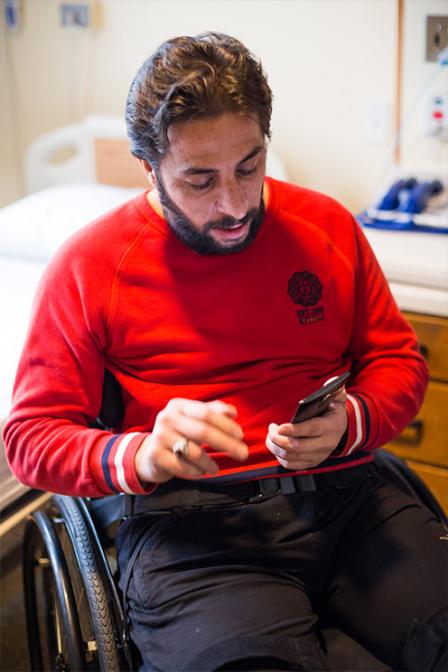 Salih Kardoosh connects with his family in Syria through QEII WiFi